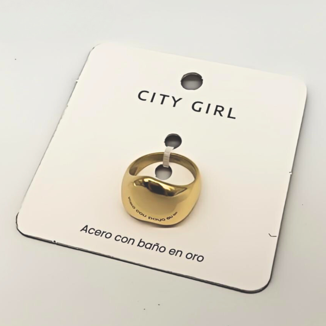 ANILLO DE ACERO BAÑADO EN ORO CITY GIRL (PAQUETE X 12 UNID.) 4460-2517